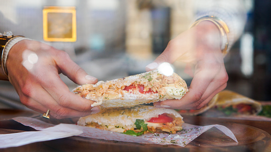 Closeup of Tapioca flour sandwich in hands