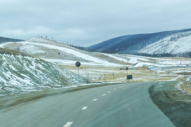 istock Highway road winter season in Ulaanbaatar, Mongolia 1576590150