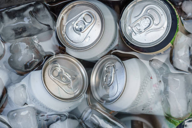istock Cold, refreshing drink in a shiny aluminum can with ice cubes. 1576627344