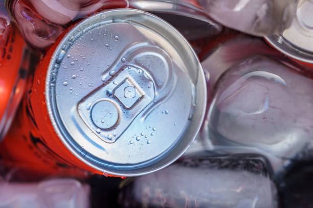 istock Aluminum can of carbonated soft drink in a container with ice 1576627352