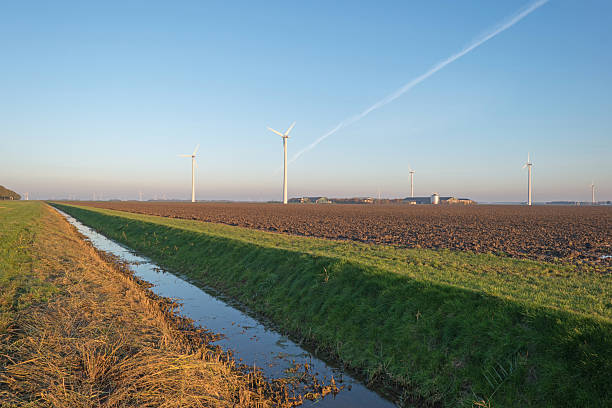 istock Wind turbines in the light of sunset 157669118