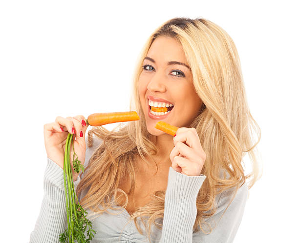 istock young woman having a carrot 157671604
