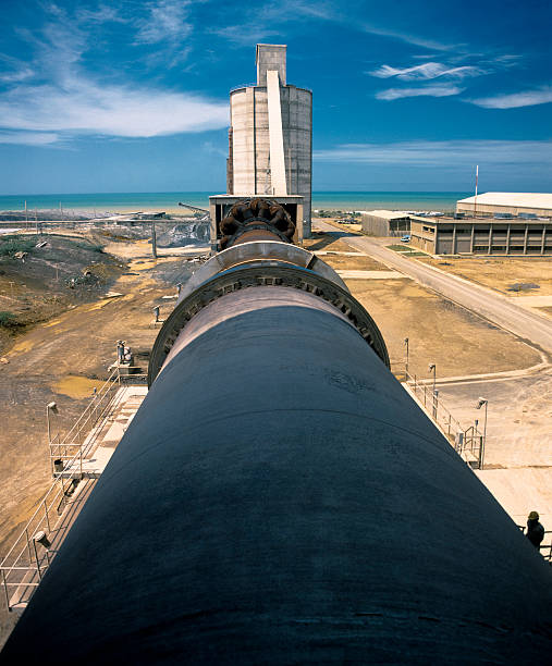 cement factory near the sea stock photo