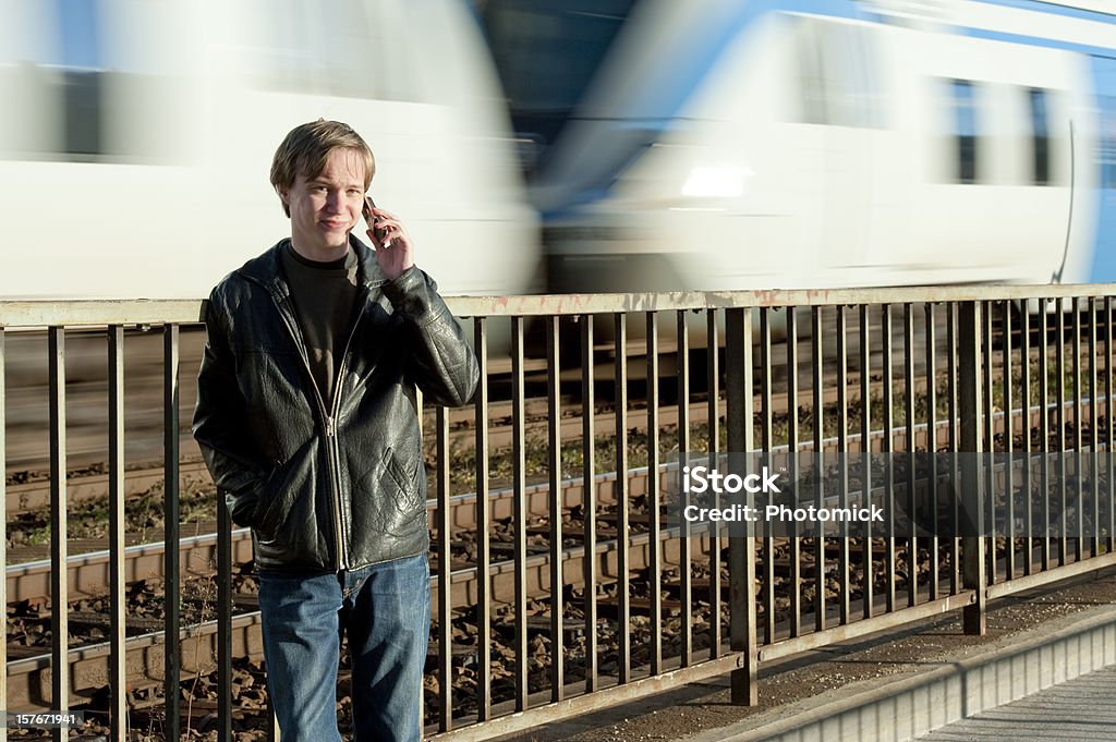 Young man with mobile phone  Adolescence Stock Photo