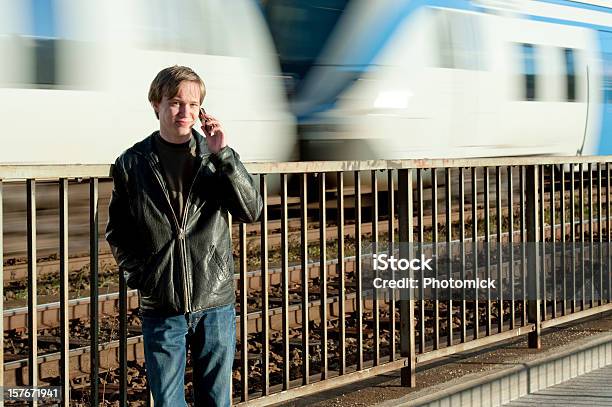 Young Man With Mobile Phone Stock Photo - Download Image Now - Adolescence, Adult, Blond Hair