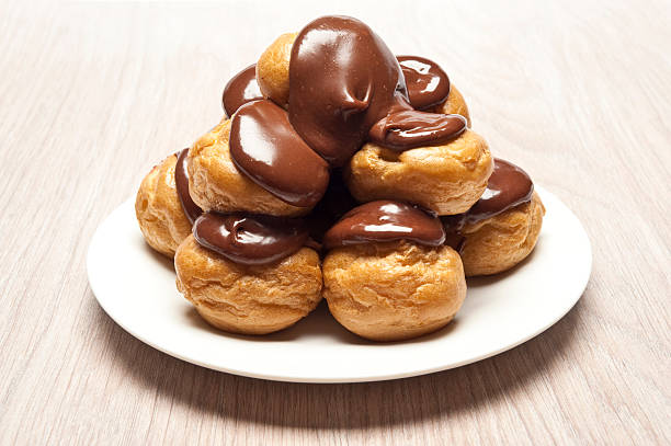 Profiteroles  choux pastry photos stock pictures, royalty-free photos & images