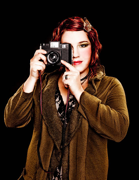 istock Woman with Toy Camera 157672137