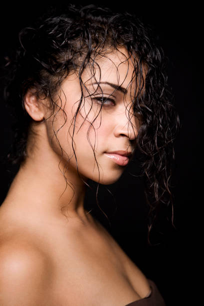 Mixed Race Woman With Wet Curly Hair Stock Photo - Download Image Now -  Wet, Fashion, Make-Up - iStock