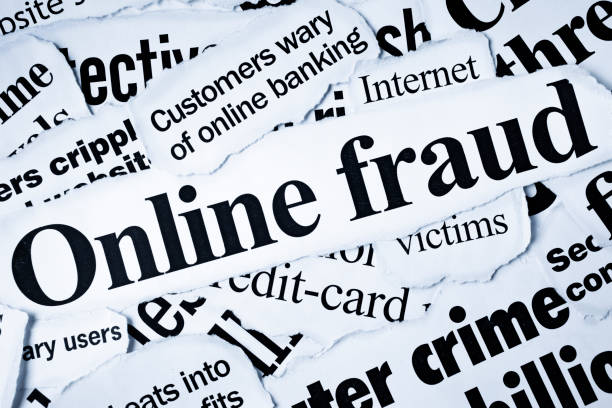 istock Newspaper headlines dealing with online fraud & computer crime 157672410