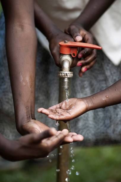 istock African children with cupped hands 157672623