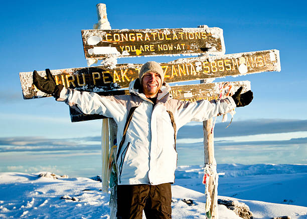 Climber at the Top of Mount Kilimanjaro stock photo