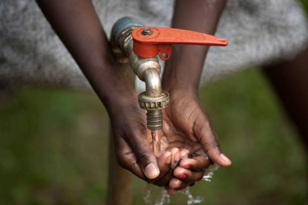istock Hands of a african child under tab 157672847