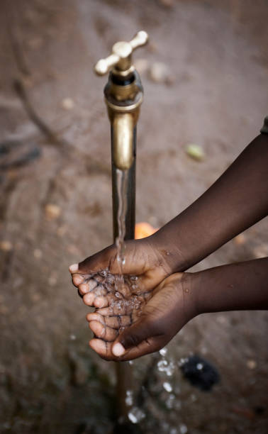 istock Hands of a african child under tab 157672851