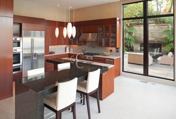 istock Beautiful modern kitchen with an outdoor patio sitting area 157673067