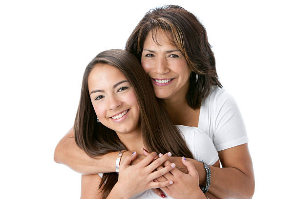 Real People: Head Shoulders Smiling Hispanic Mother and Teenage Daughter  45 49 years photos stock pictures, royalty-free photos & images