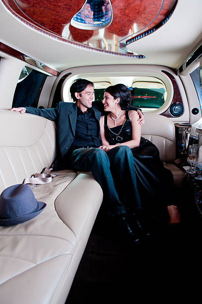 istock Couple in a Limo 157673497