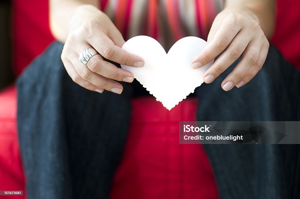Young Woman Holding Paper Heart Shaped Symbol Royalty free stock photo of young woman holding paper heart shaped. Adult Stock Photo