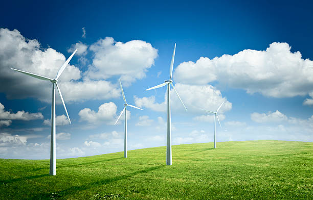 Windy field with wind turbines. Renewable energy illustration. Wind turbines on hilly field rolling field stock pictures, royalty-free photos & images