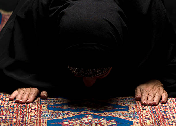 istock Muslim woman  praying 157673793