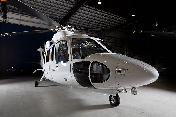Corporate Helicopter in Hangar stock photo