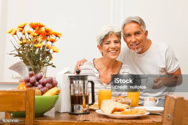 Happy Senior Couple Having Breakfast Stock Photo - Download Image Now - 50-59 Years, Active Seniors, Adult