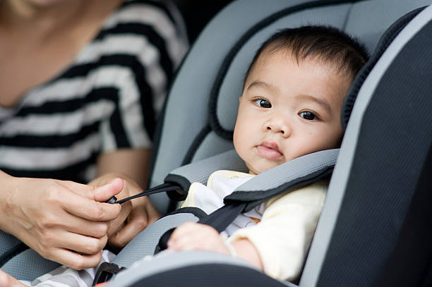 istock Cute baby boy in safety seat. 157674415