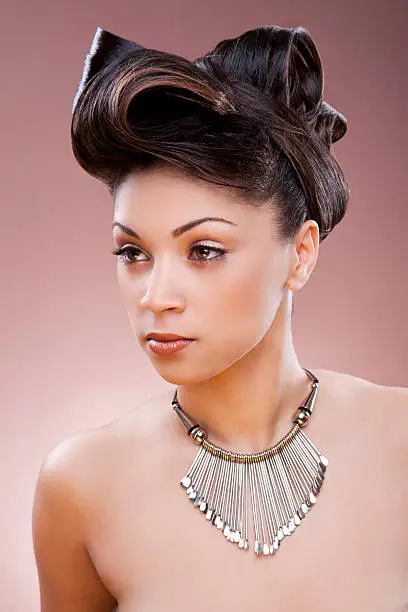 Photo of Ethnic woman with updo