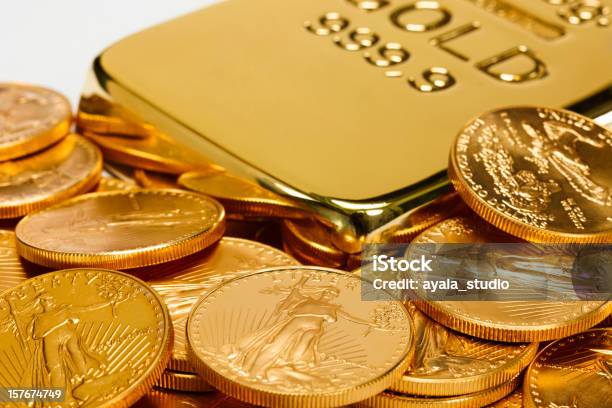 Gold Ingot Surrounded By Golden Coins Stock Photo - Download Image Now - Ingot, Coin, Gold - Metal