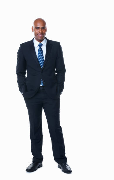 istock Middle aged business man with hands in pocket against white 157674836