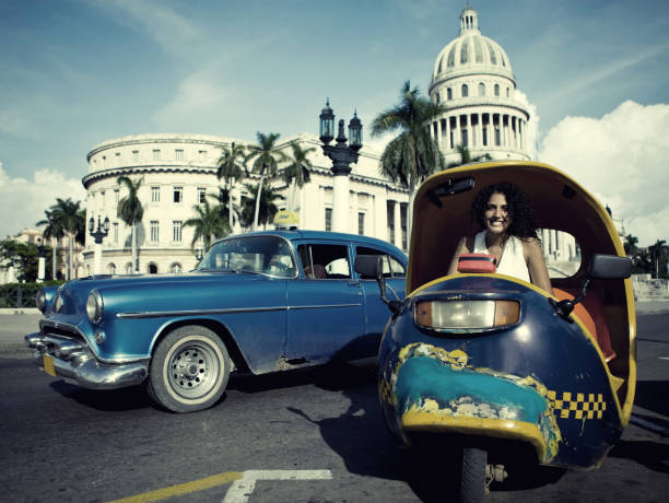 Attractive cuban woman posing by the El Capitolio