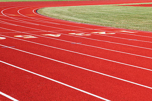 istock Red Running Track Numbered Lanes with White Lines 157674954
