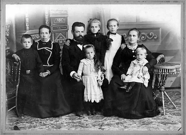 Vintage family portrait. 10s anniversary of wedding. The year 1901.