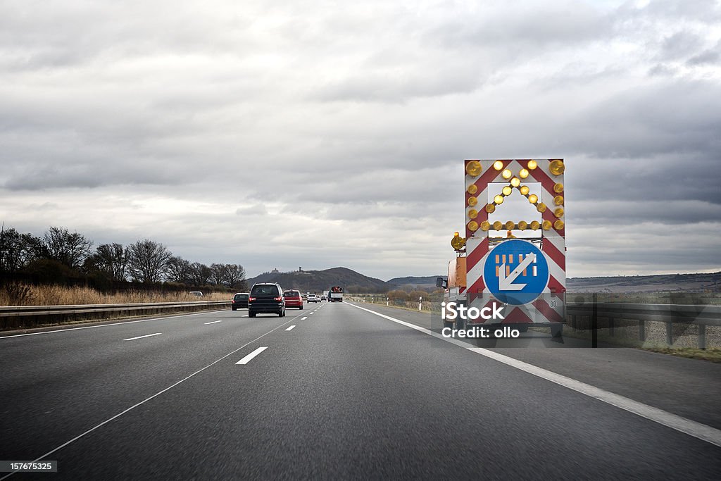 Warning sign on highway - construction site ahead  Highway Stock Photo