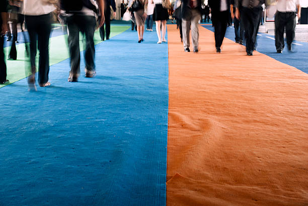 Pedestrians walking on a carpet  tradeshow photos stock pictures, royalty-free photos & images