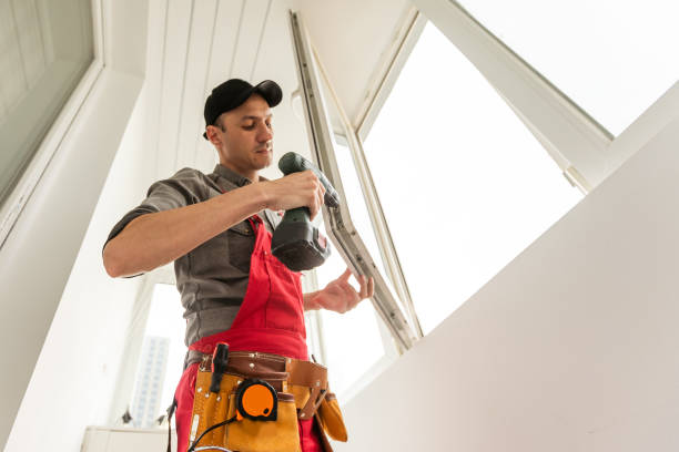 istock The foreman installs a window frame in the room 1576757562