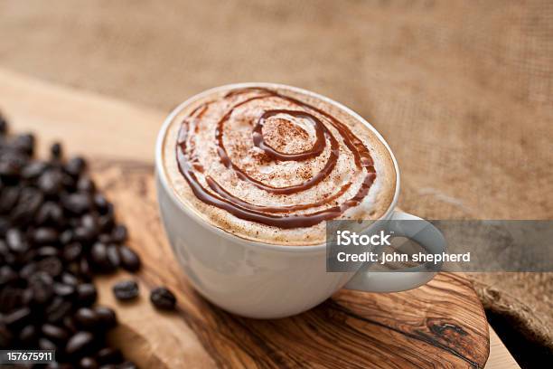 Cappuccino Topped With Swirls Of Chocolate Sauce Stock Photo - Download Image Now - Mocha, Cappuccino, Chocolate Sauce