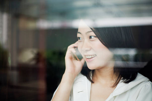 istock Businesswoman behind window 157675975
