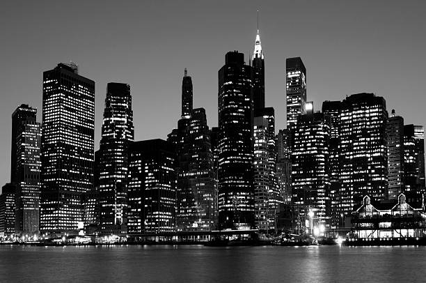 Lower Manhattan Skyline NYC Black And White Financial district in the night. grain added. high contrast photos stock pictures, royalty-free photos & images