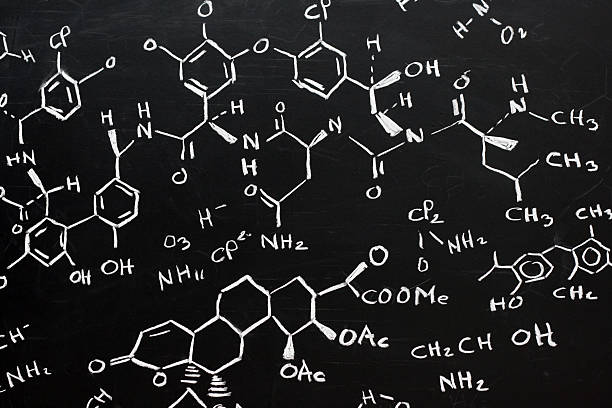Chemical formula written stylishly on a black background blackboard full of chemical formula chemical formula photos stock pictures, royalty-free photos & images