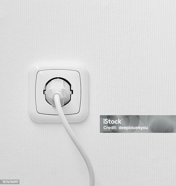 Brand New Outlet On A White Wall With Plug Stock Photo - Download Image Now - Electrical Outlet, Electric Plug, Network Connection Plug