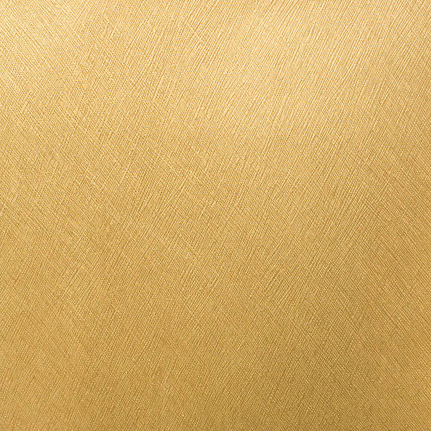 Golden Paper textured background A golden card textured background from gold. gold leaf metal photos stock pictures, royalty-free photos & images