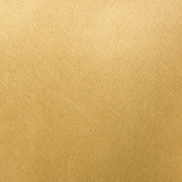 Golden Paper textured background A golden card textured background from gold. gold leaf stock pictures, royalty-free photos & images