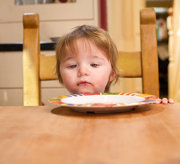 istock Baby Girl at the Kitchen Table 157676493