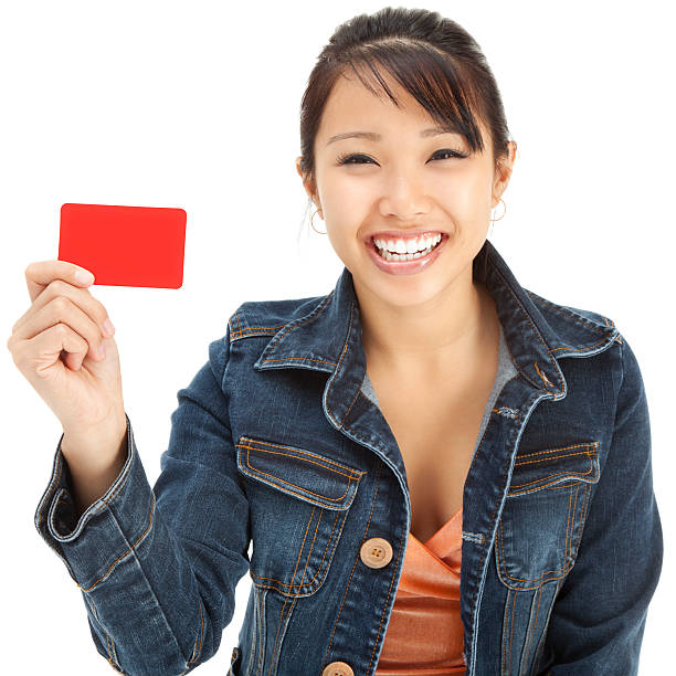 istock Enthusiastic Young Asian Woman with Blank Gift Card 157676532