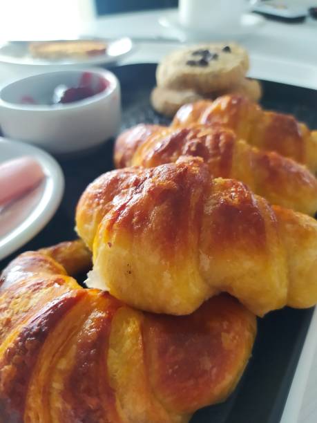 istock Croissants in the foreground 1576770495