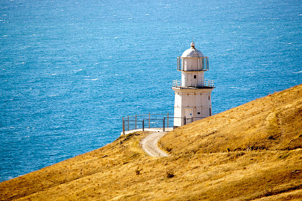 istock Lighthouse at the edge of Meganom cape 157677654