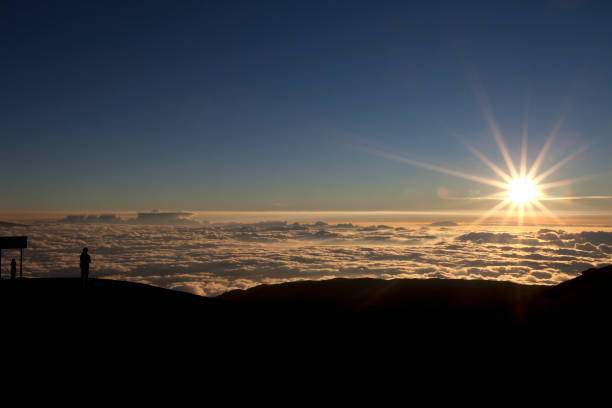 Cinder cone on the summit of Mauna Kea in Winter on the Big Island of Hawaii. Mauna Loa seen in the background.