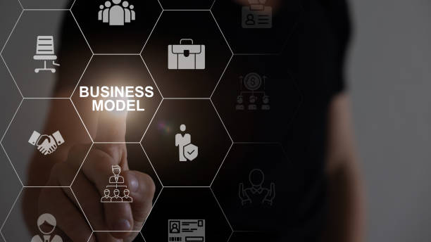 istock Business ethics concept. Ethical investment, sustianable development. Business integrity and moral. Businessman touching on BUSINESS ETHICS wording on smart screening surrounded by ethical elements. 1576777821