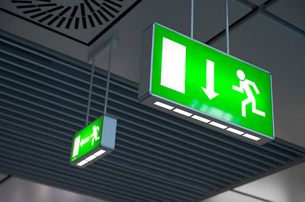 Emergency exit light sign stock photo