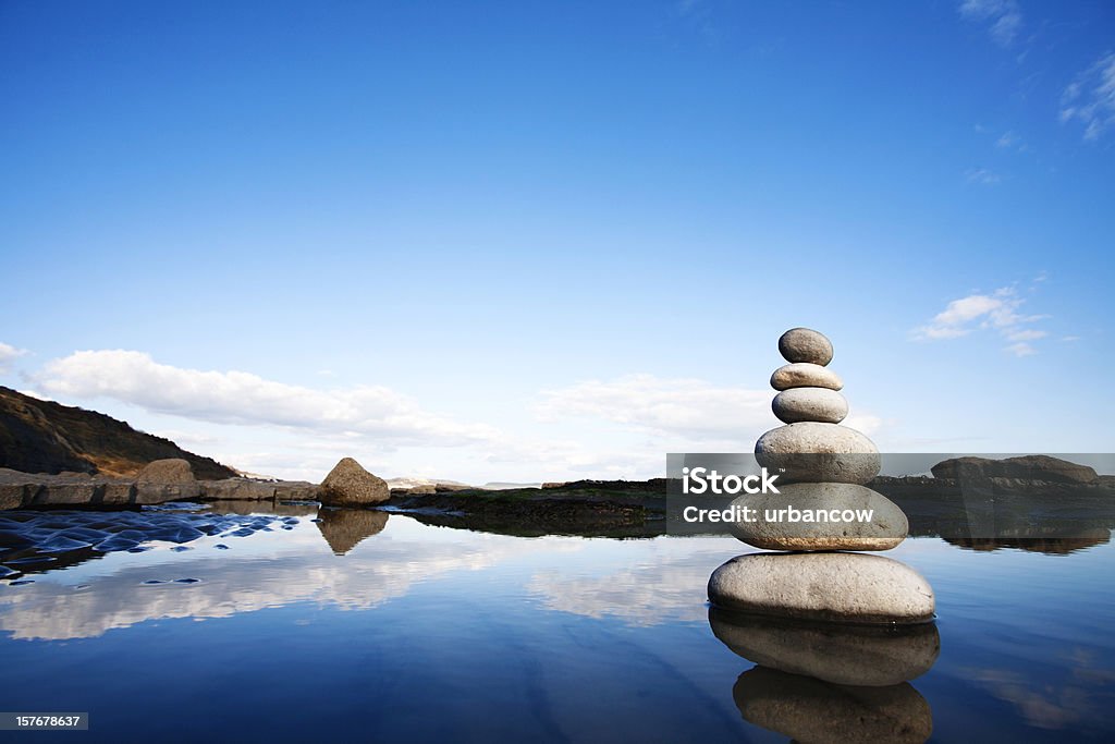 Natural balance A stack of stones on a beach Balance Stock Photo